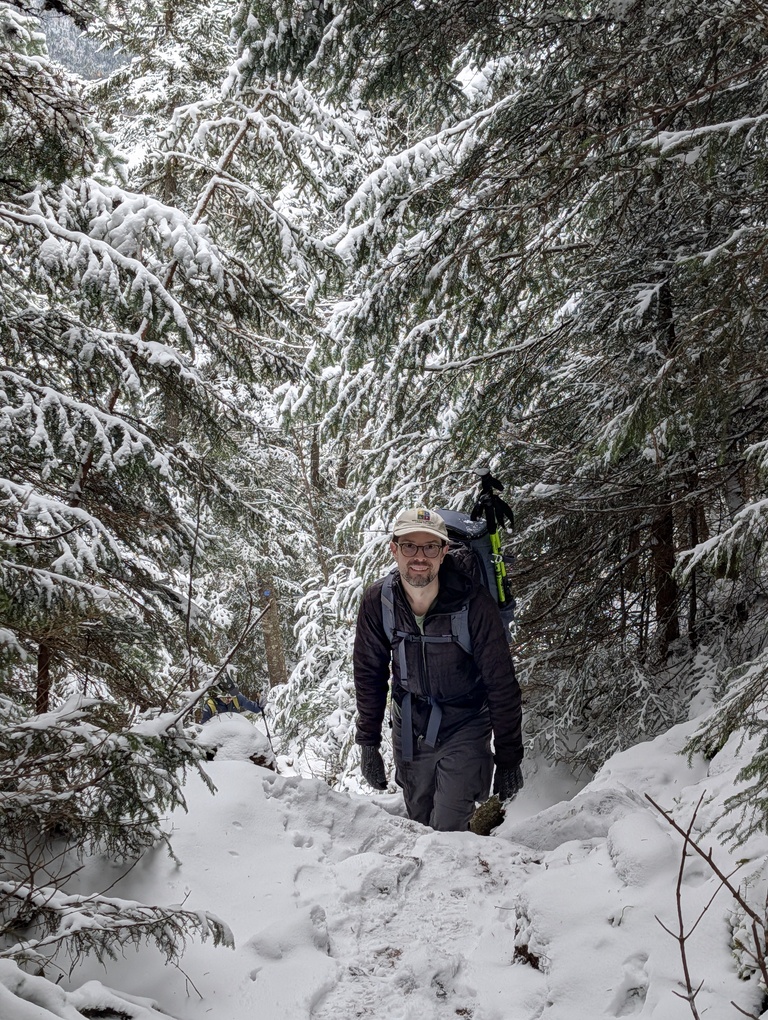 Dan looking up in the snow